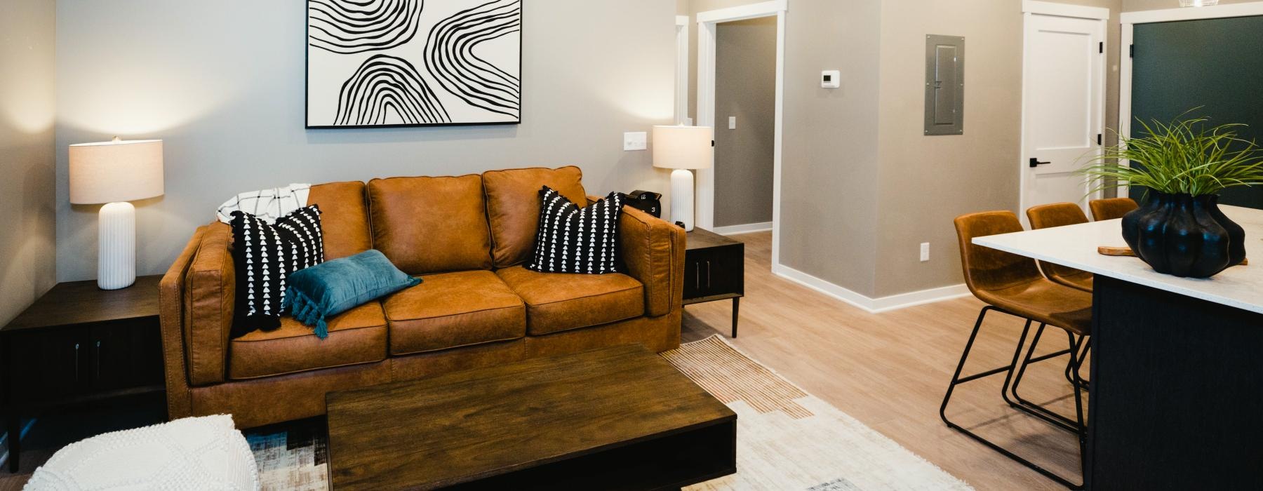 a living room with a couch and a table