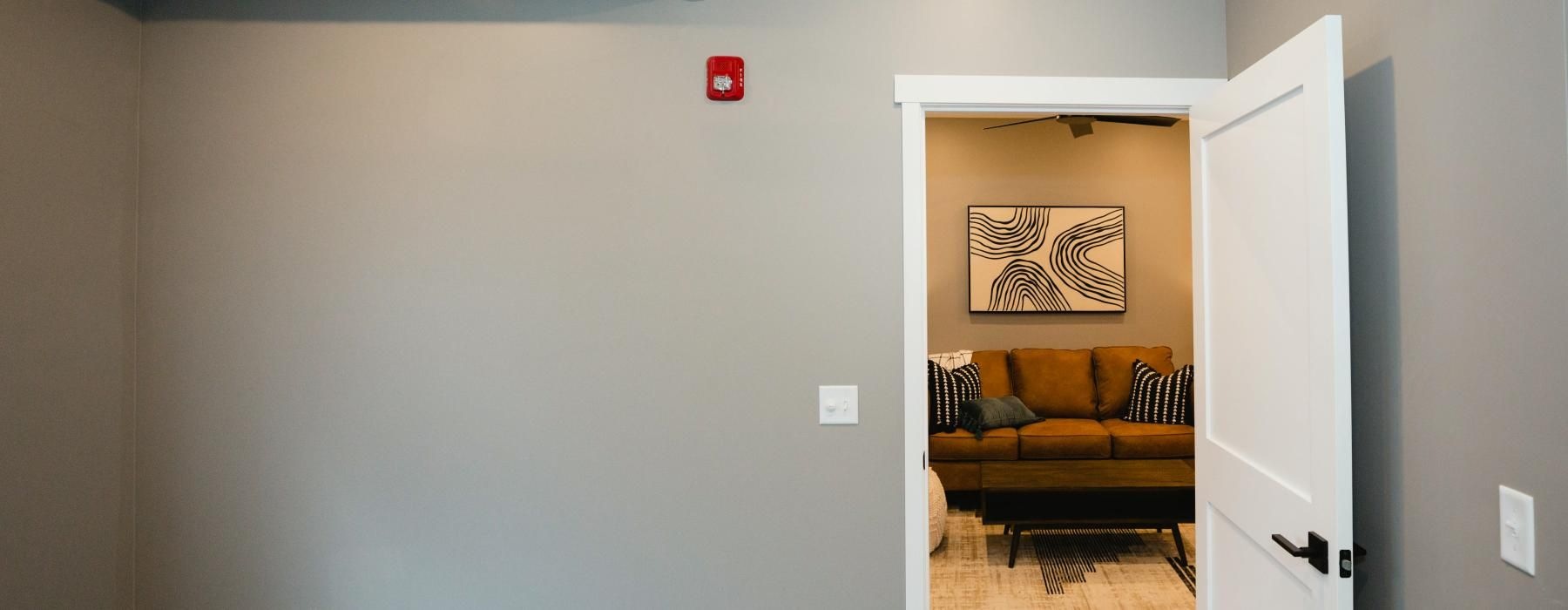 a large room with gray walls